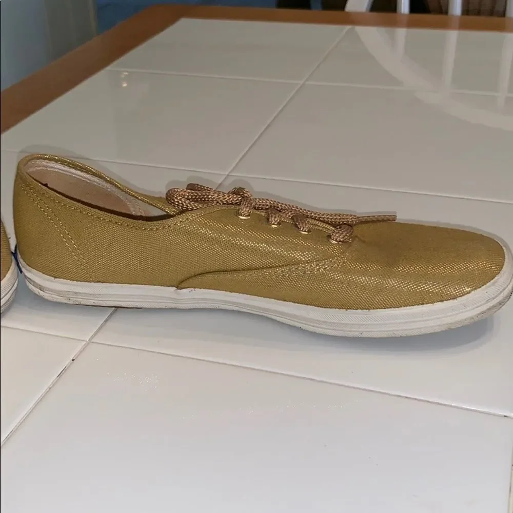 Keds gold sneakers with gold laces‎